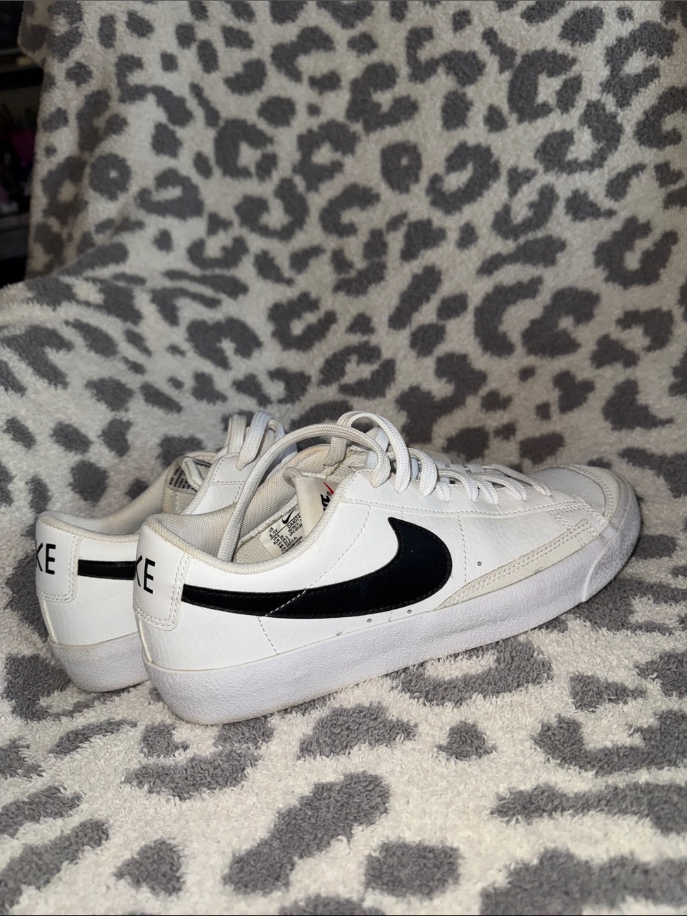 Youth Nike White Sneakers with Black Swoosh
